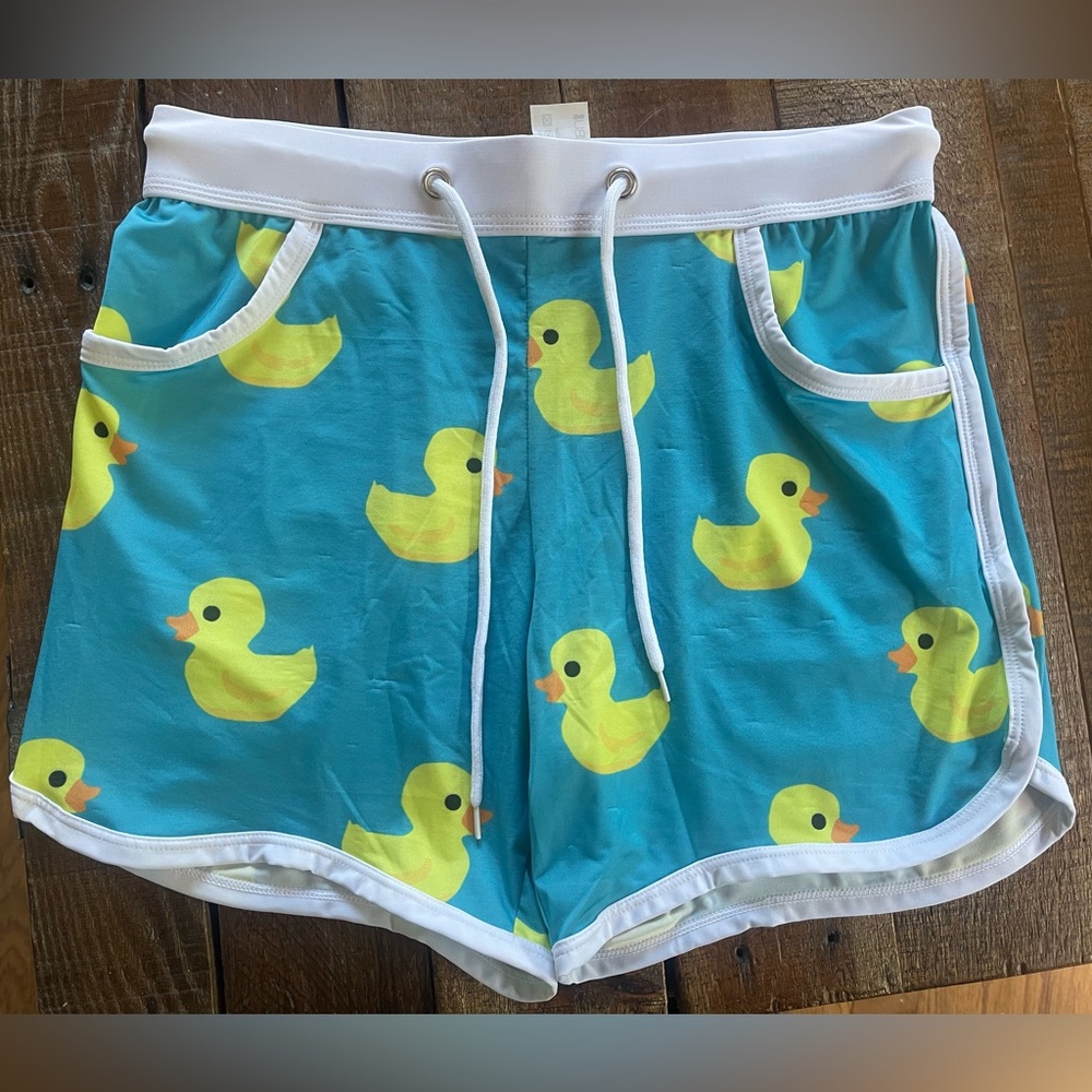 Mens size small JJ Malibu shorts. Mens small rubber ducky shorts/ swim suit